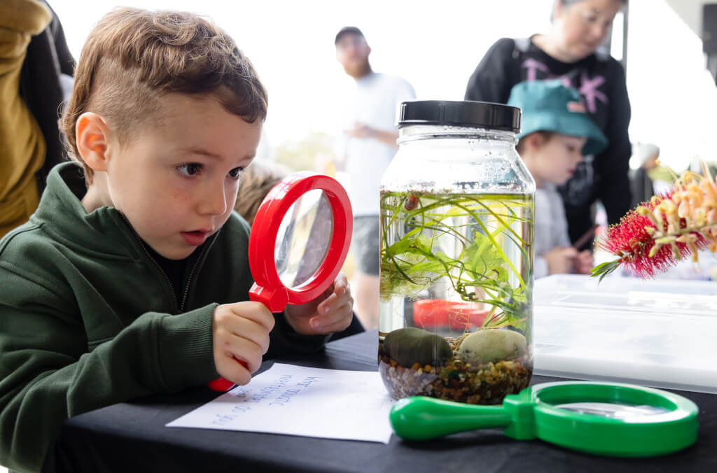 education-abg-community-day-kid-looking-at-plants-1024x676.jpg