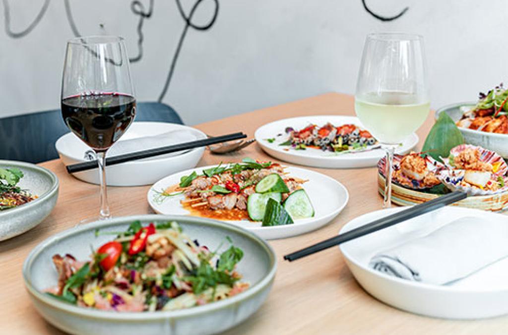 Food and wine on the table at Botanic House